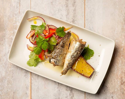 Bom Petisco Portuguese sardine tasting pack served on a plate